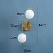 Astra Dual Globe Gold Wall Light